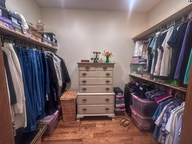 One of two master bedroom walk in closets