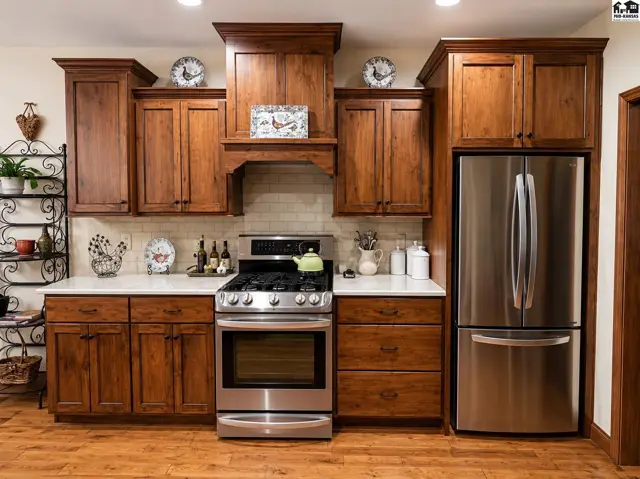 built in exhaust hood and wood floors