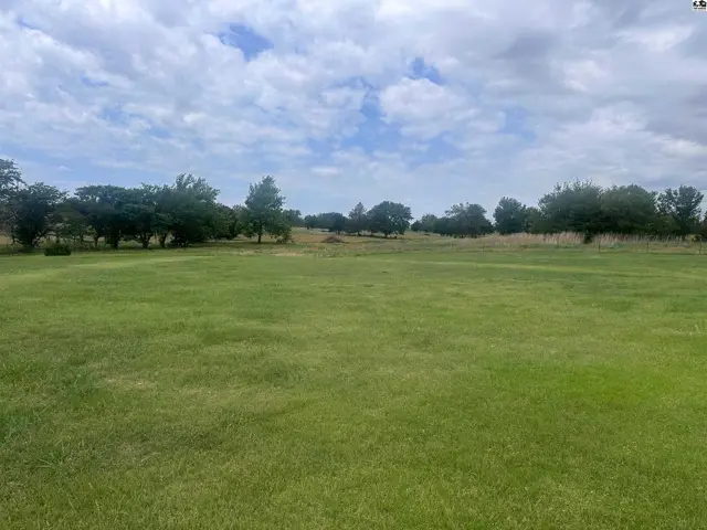7.04 Acres on what was formerly Green Valley Golf Course. Home Located within 3 miles of Pratt, KS
