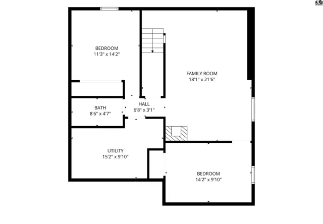 This floor plan shows two bedrooms, a bath, utility room, hall, and family room.