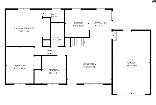 This floor plan shows a three-bedroom home with two baths, a kitchen, dining area, living room, and garage.