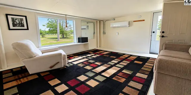 sun room in main house looking toward front door